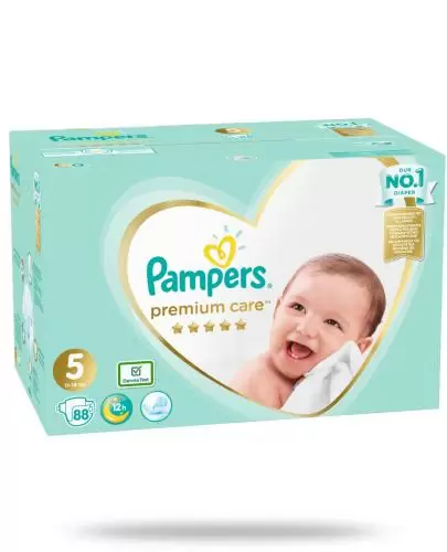 zielone male kulki w kupce niemowlaka pampers